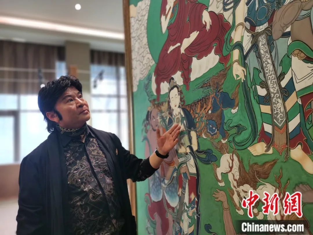 國家一級美術師劉觖。張?zhí)砀?攝