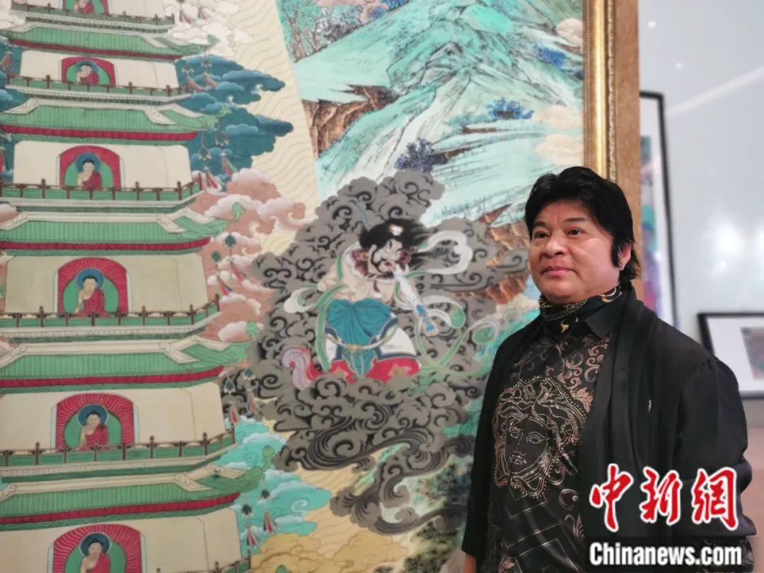 國家一級美術師劉觖。張?zhí)砀?攝