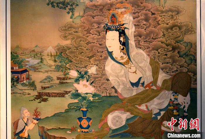 圖為5月16日，展覽中新創(chuàng)唐卡作品《靜息觀音》(局部)。　李林 攝